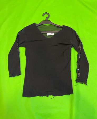 Schwarzes Langarmoberteil mit Pailletten