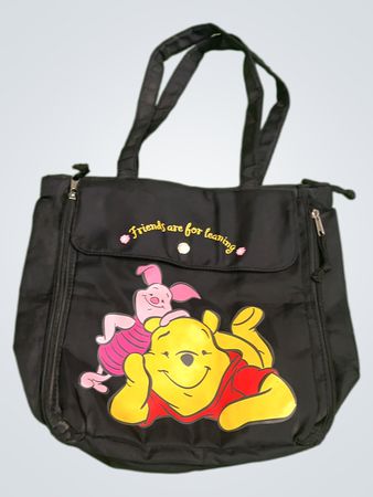 Schwarze Tragetasche mit Winnie the Pooh und Piglet Grafik