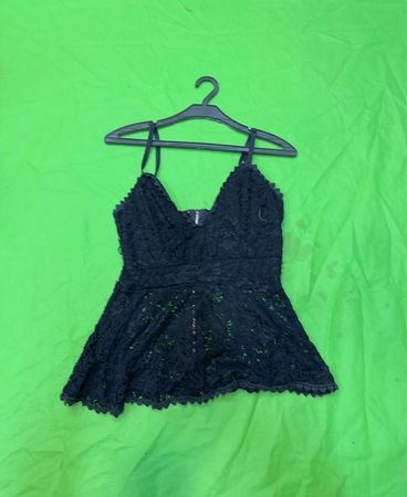 Schwarzes Spitzen-Peplum-Oberteil