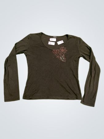 Dunkelgrünes Langarmoberteil mit floralem Design