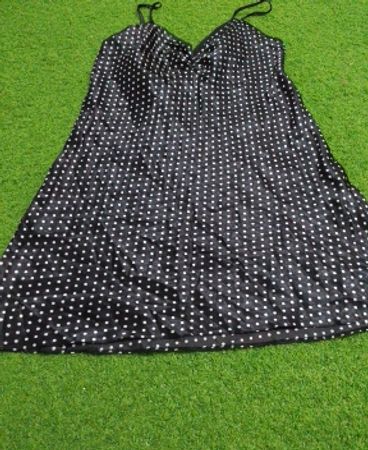Black polka dot slip dress