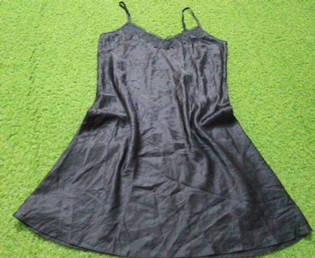 Black satin slip dress with lace trim