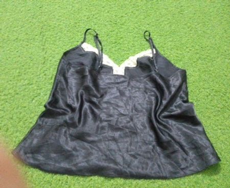 Black camisole with white lace trim