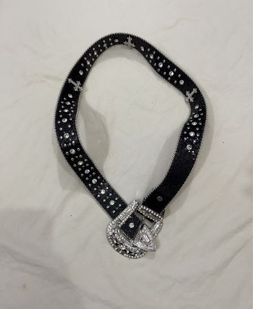 Black studded belt with silver buckle