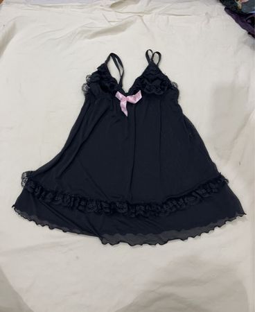 Black negligee with pink bow