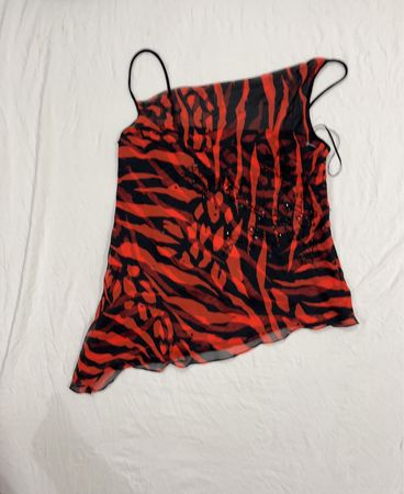 Rotes und schwarzes Tigerprint-Asymmetrietop