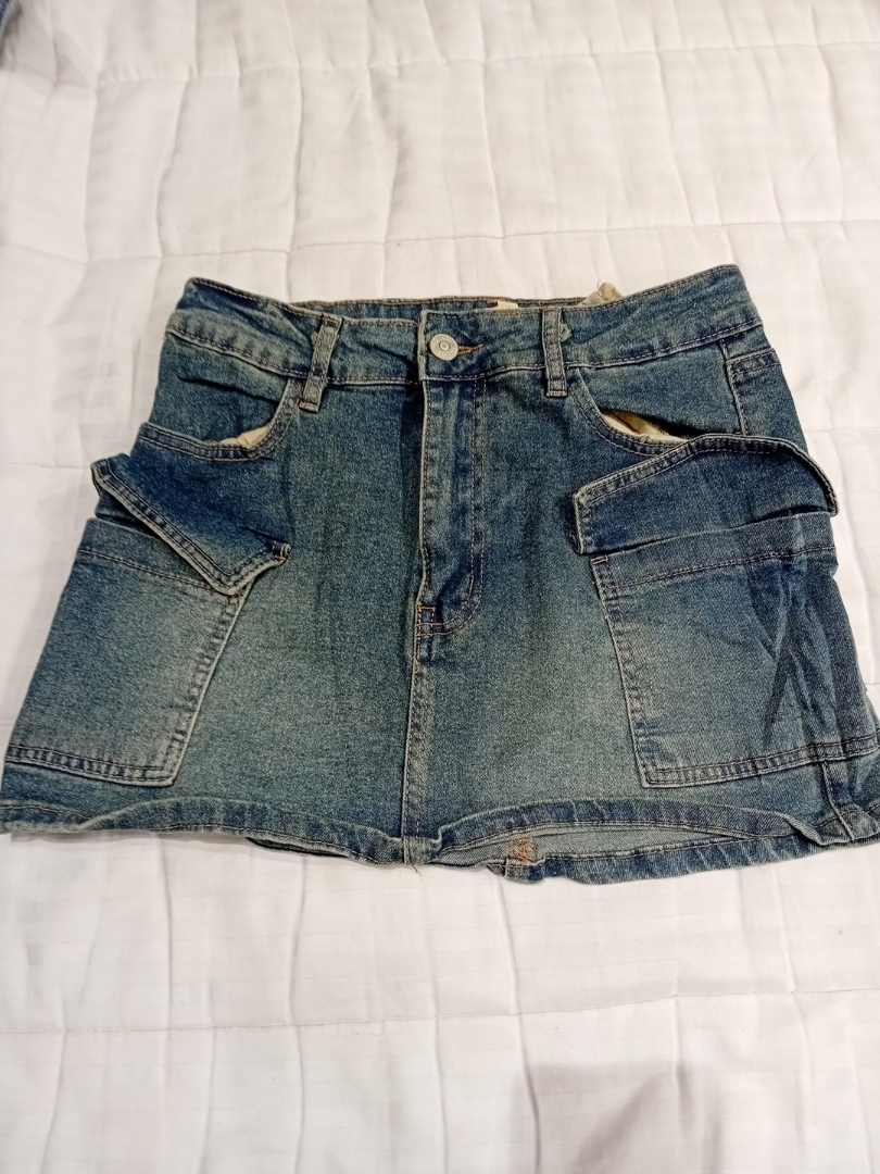 Minifalda de mezclilla Love Cult con bolsillos tip..