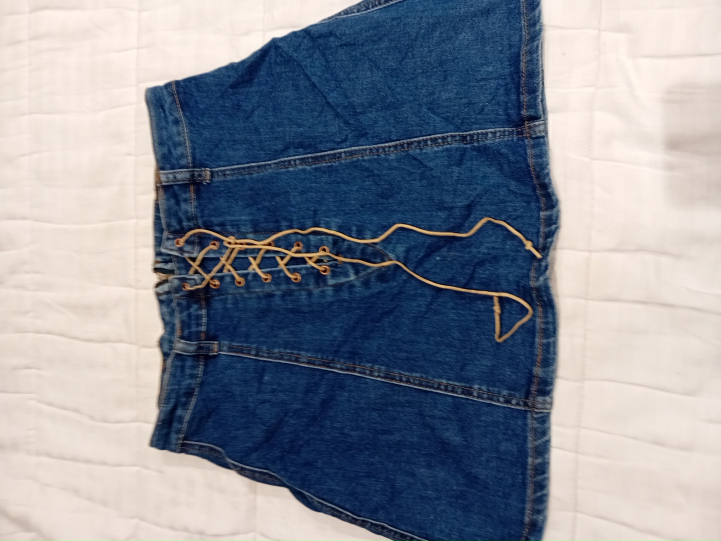 Indigo Reign Denim Mini Skirt with Lace-Up Detail