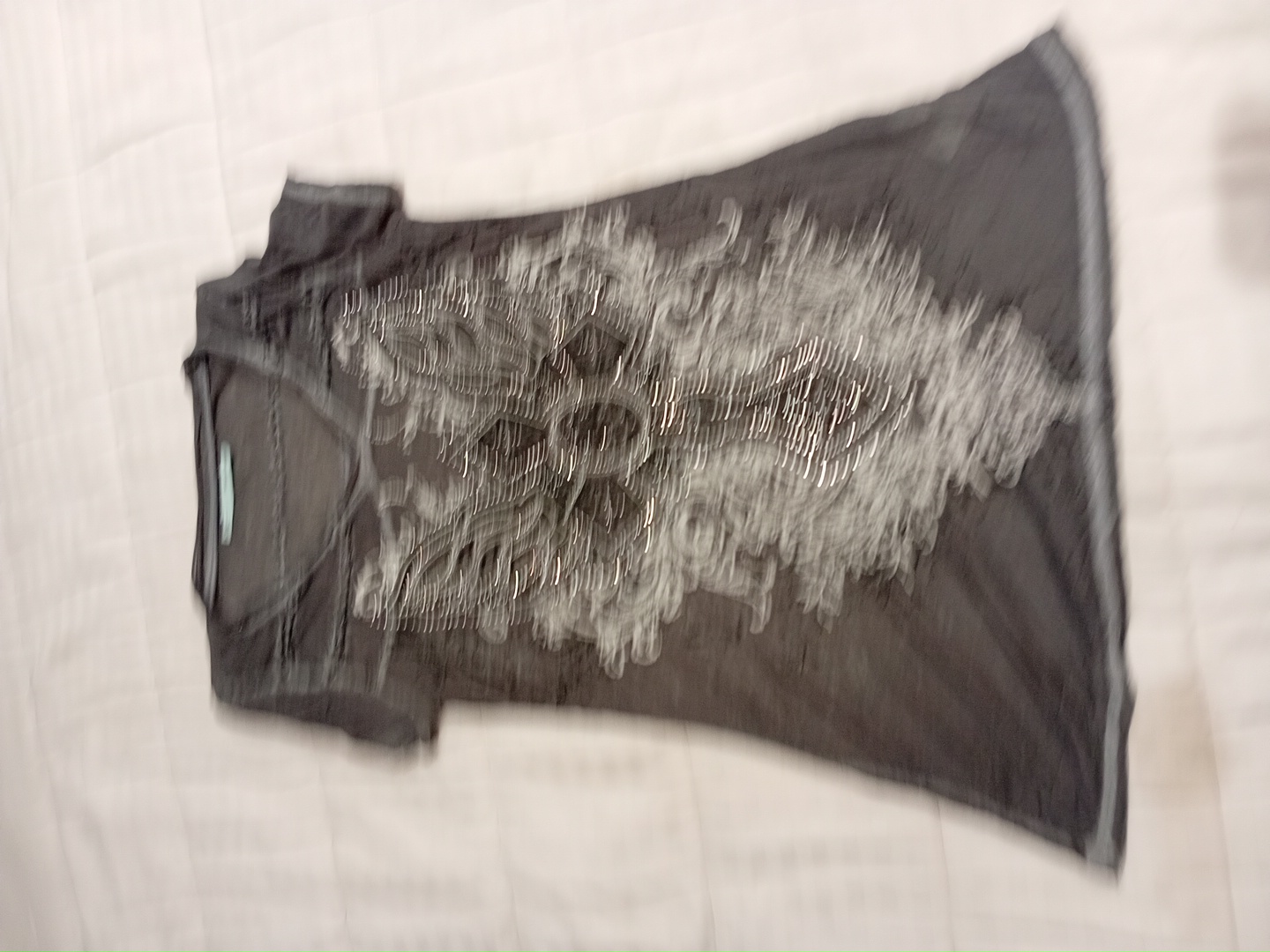 「女性用グレーのショートスリーブトップ」