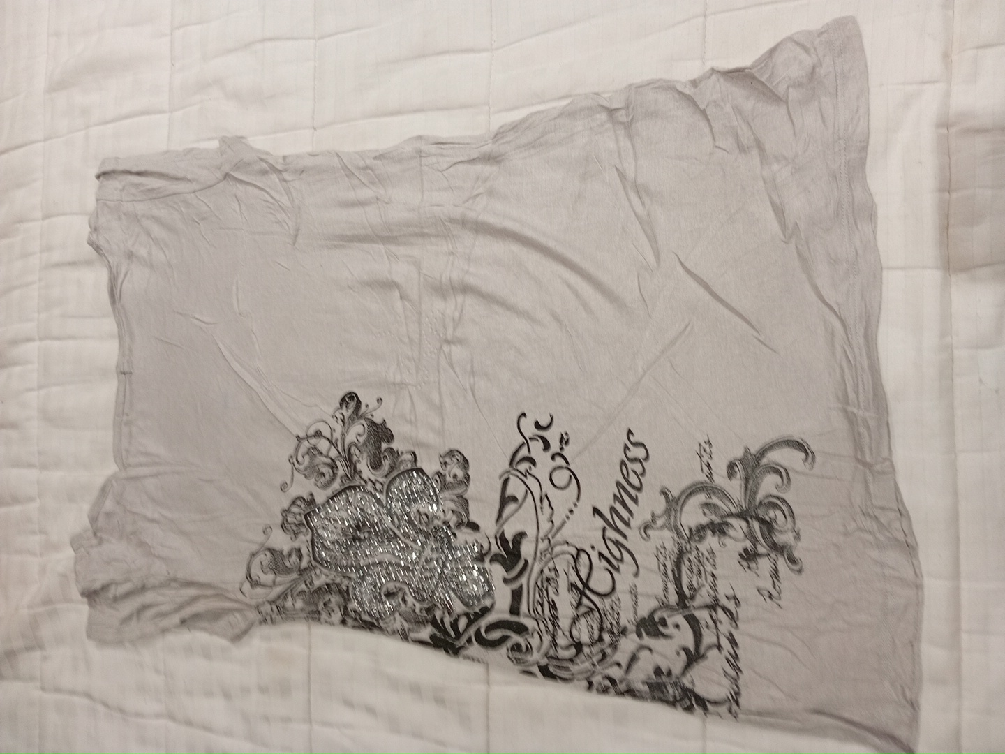 Top senza maniche grigio da donna con design flore..