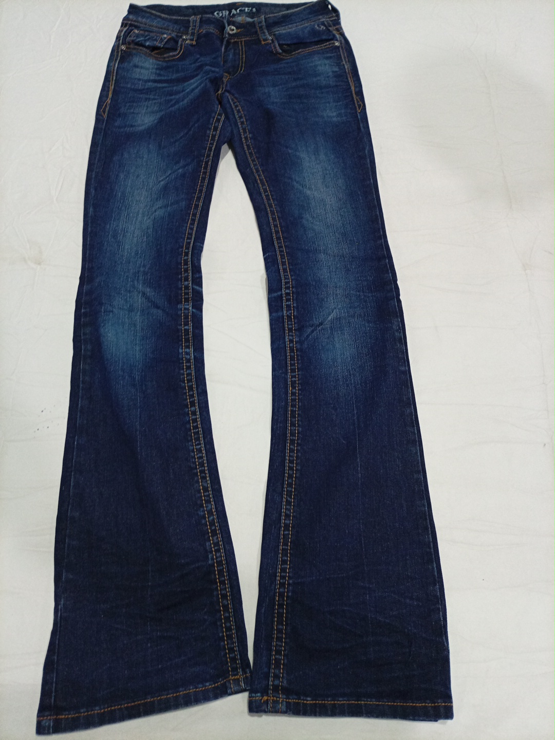 Jeans a zampa d'elefante blu scuro