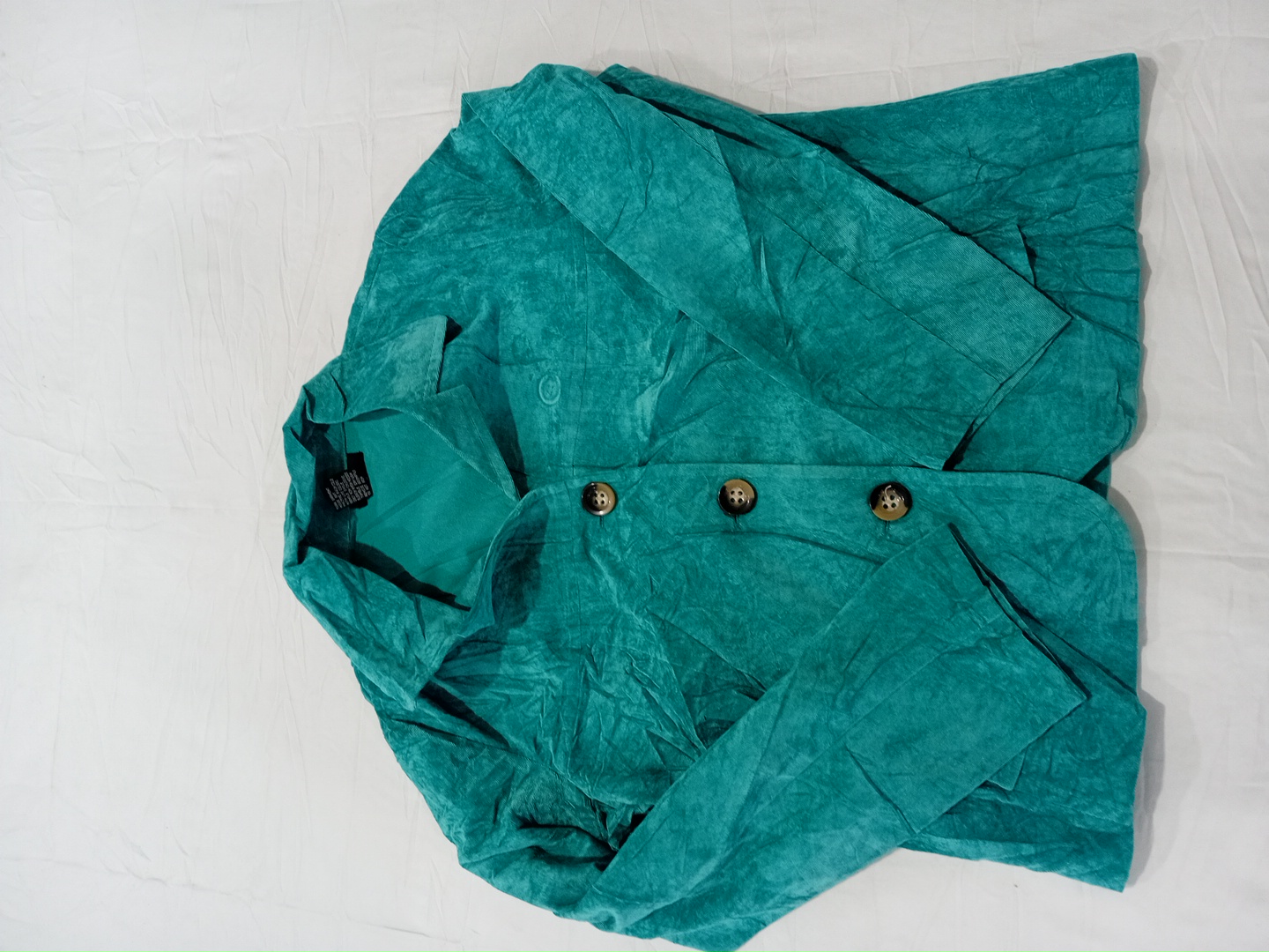 Camicetta verde acqua con bottoni