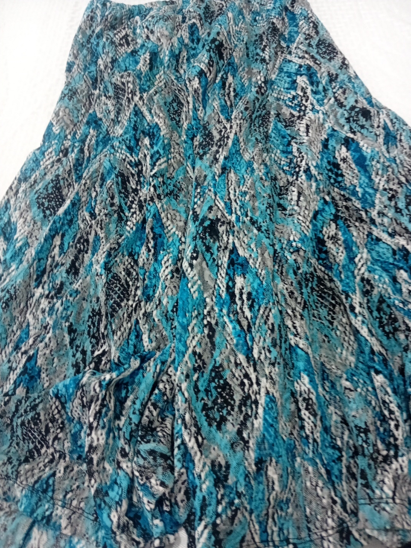 Skirt with blue, black, and white snake skin print