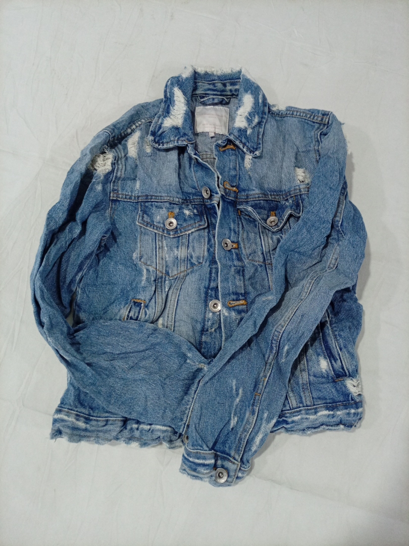 Veste en denim déchiré