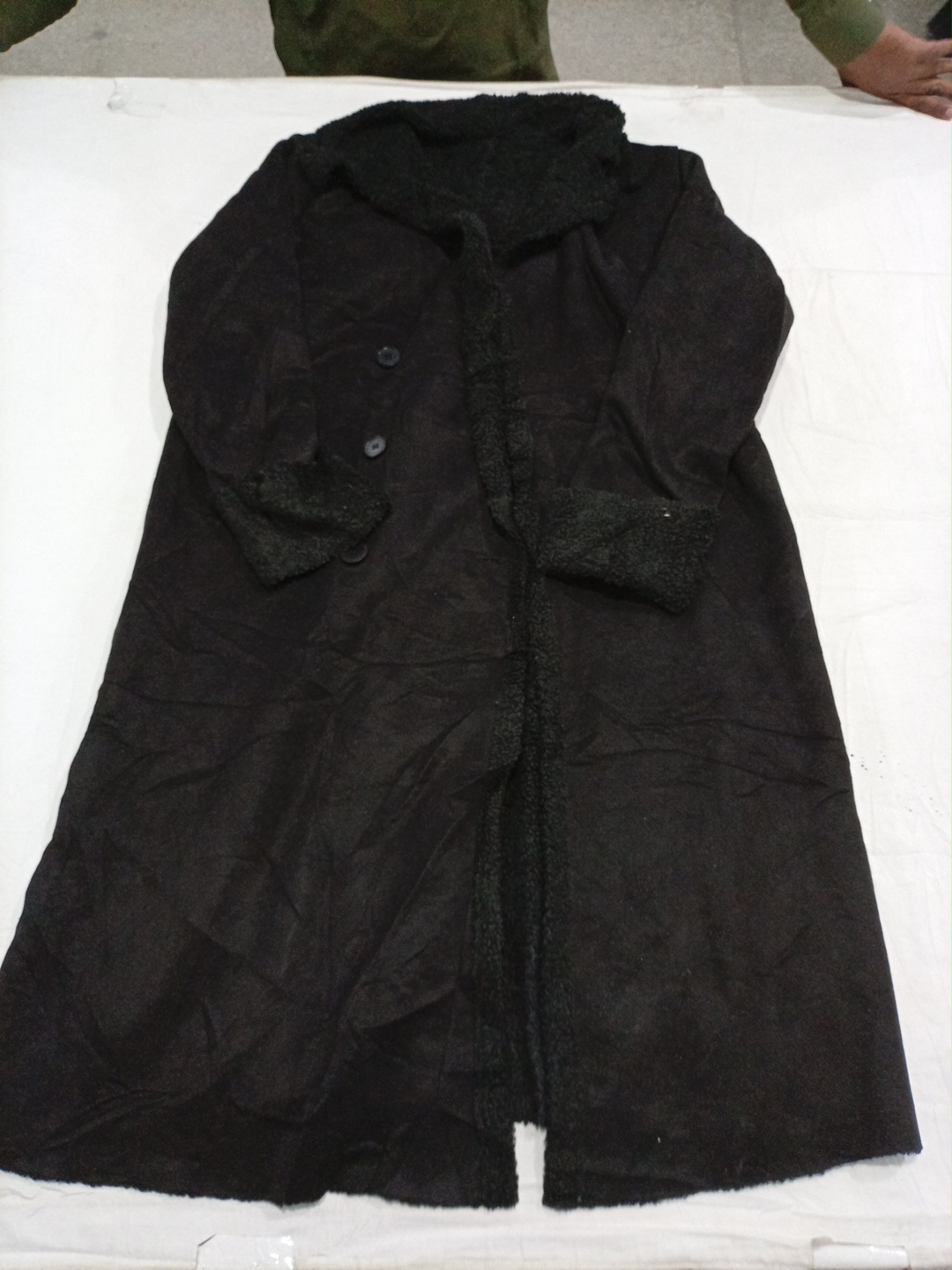 Long black coat with shearling trim