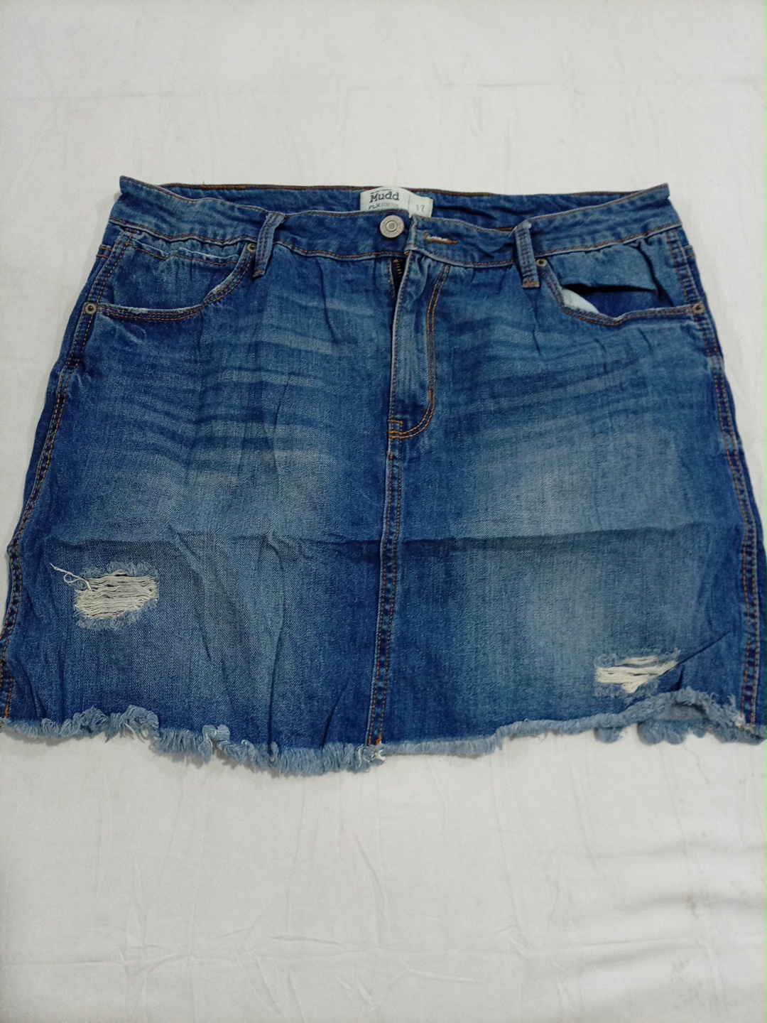 Jupe mini en denim usé Mudd FLX Stretch avec ourle..