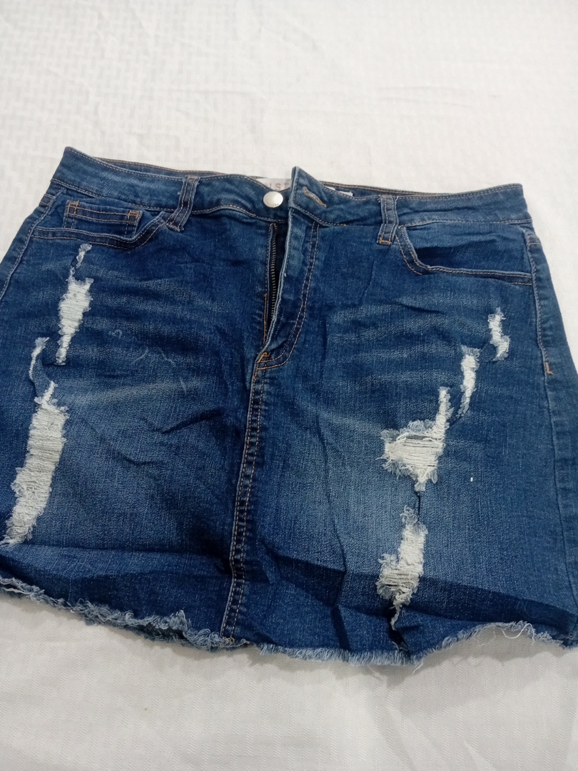 Jupe en denim mini taille haute déchirée par Insel..