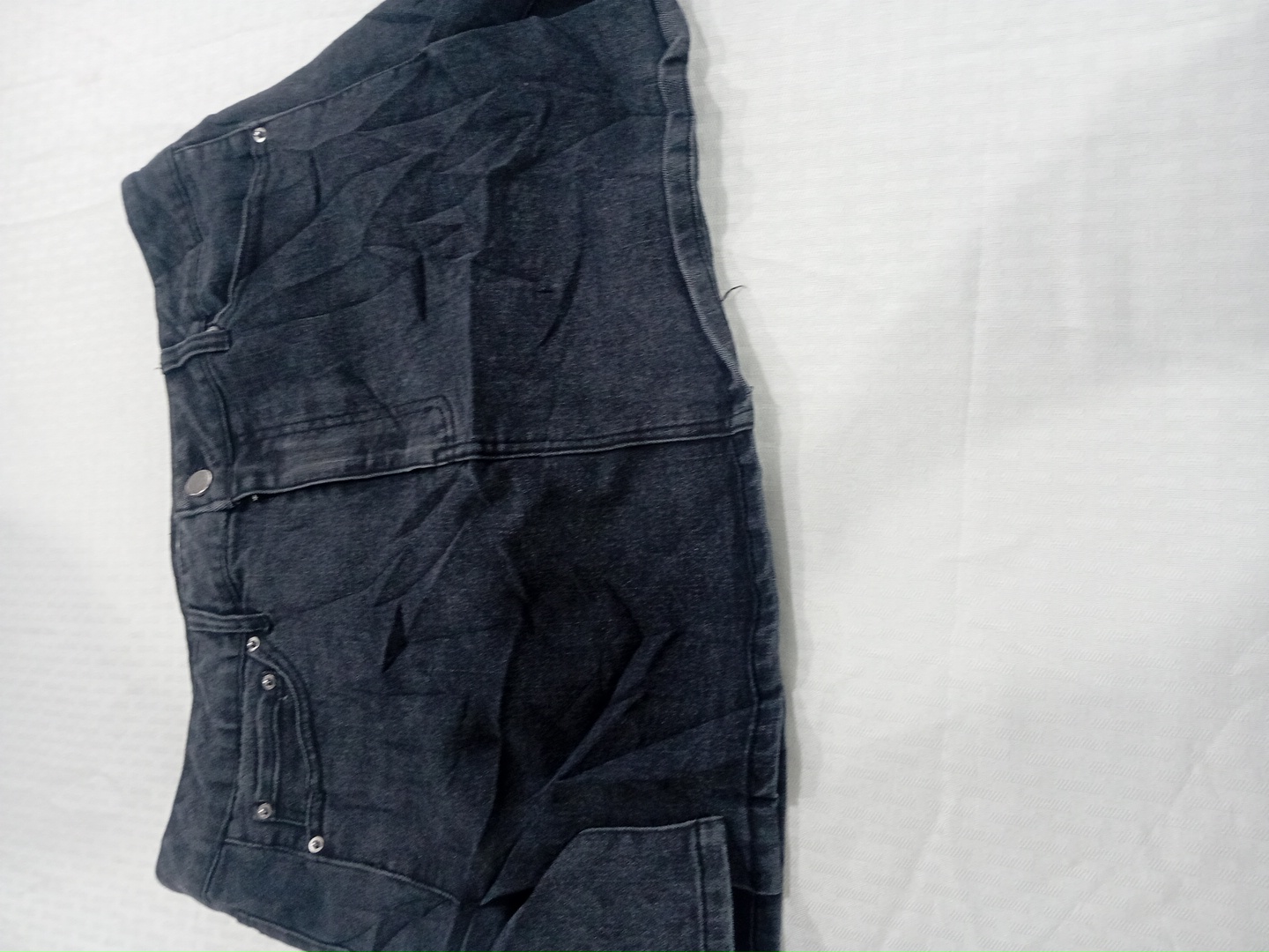 Jupe mini en denim noir par Tinsel