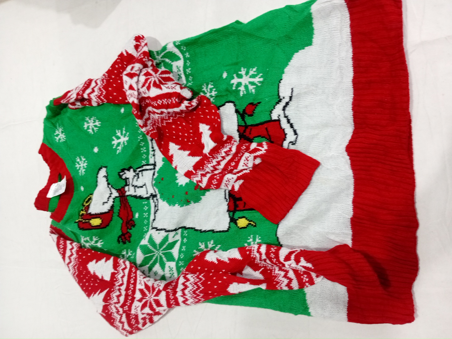 Paquete de suéteres navideños de Snoopy de Peanuts..