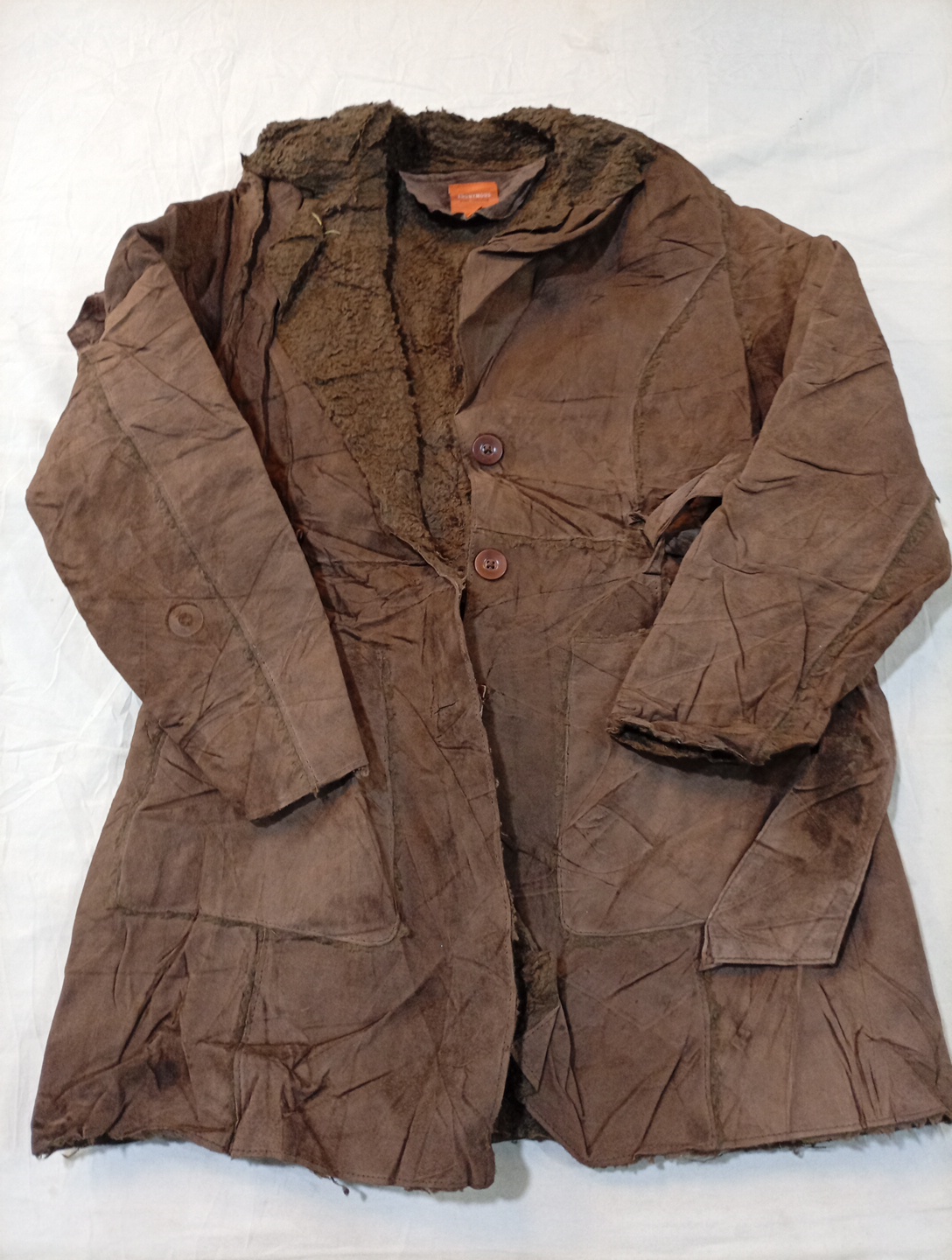Veste en cuir marron doublée de fourrure