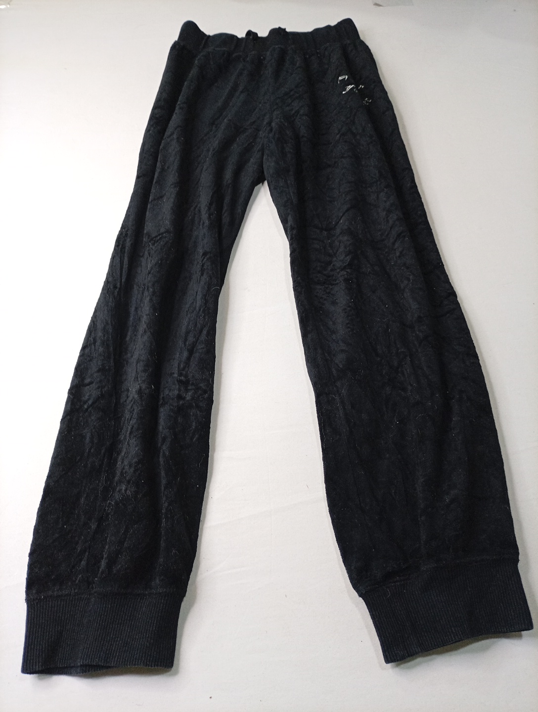 Calças de moletom de veludo preto Juicy Couture