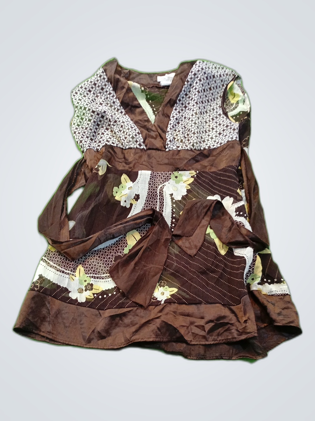 Blusa stampata senza maniche