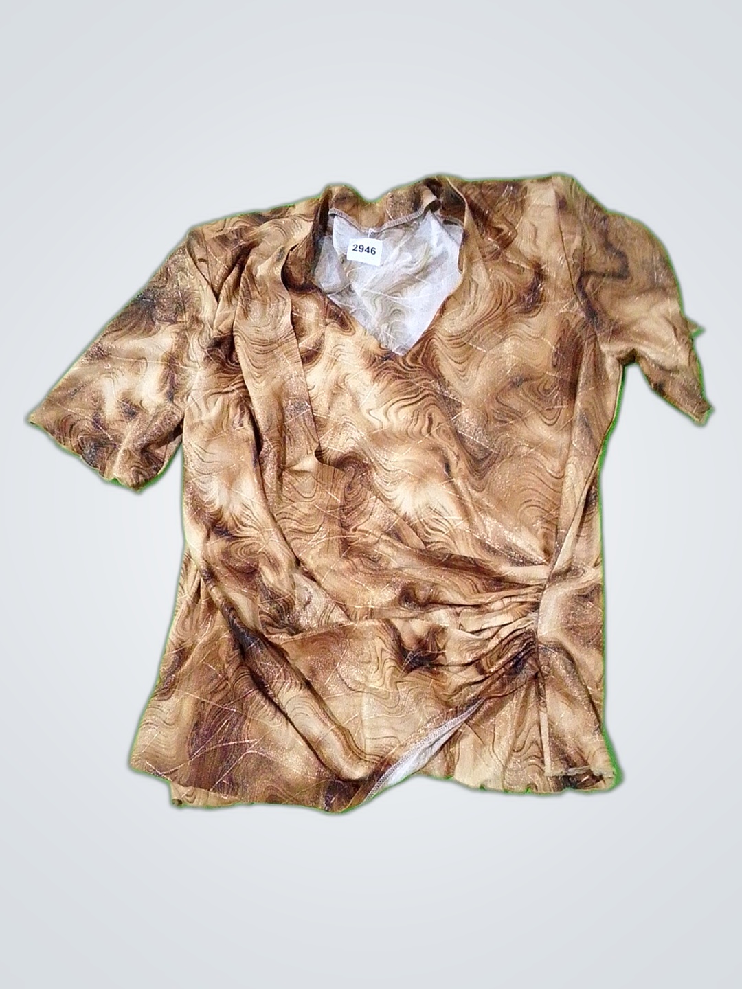 Blusa de satén con twist estampada