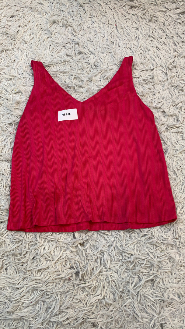 RW&CO. Top sin mangas de canalé rosa con escote en..