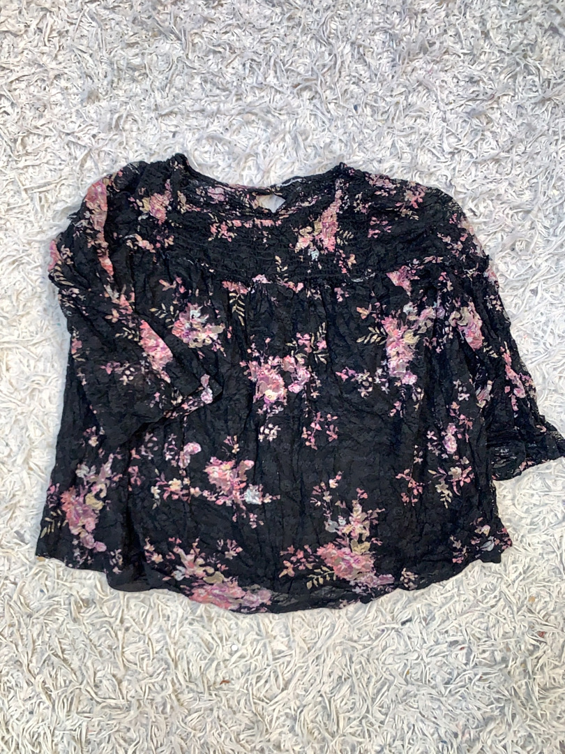 Blusa con motivo floreale