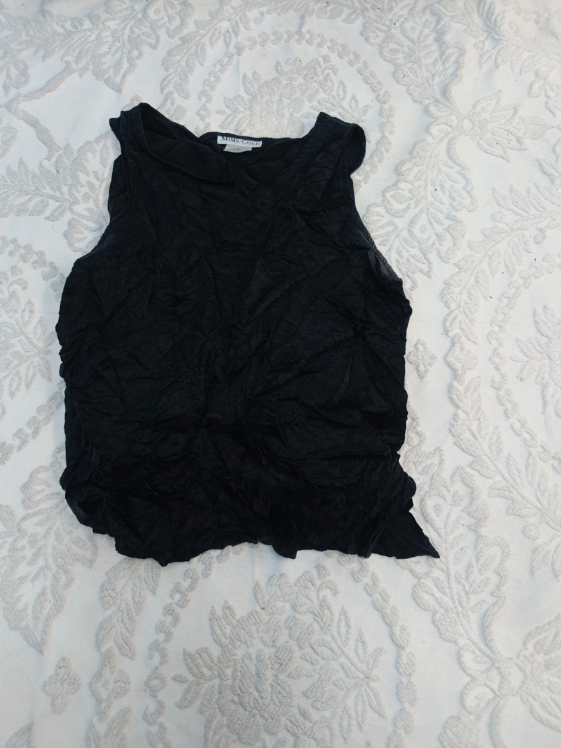Blusa di seta nera