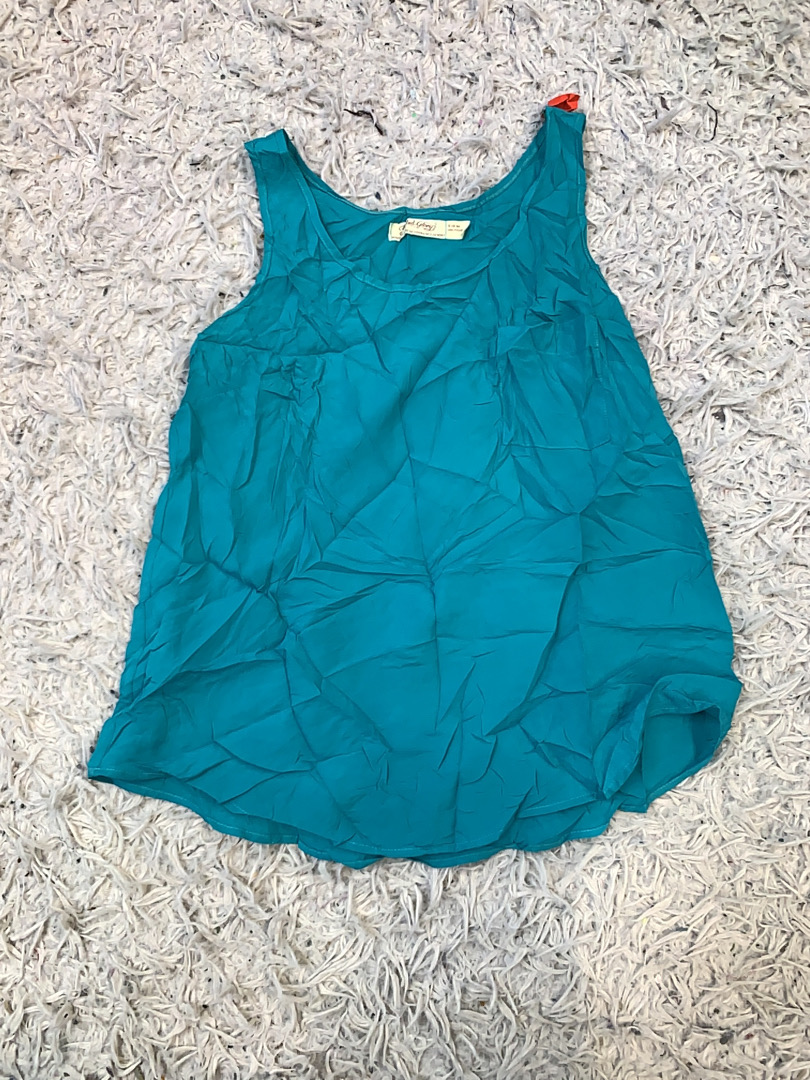 Top sin mangas verde azulado