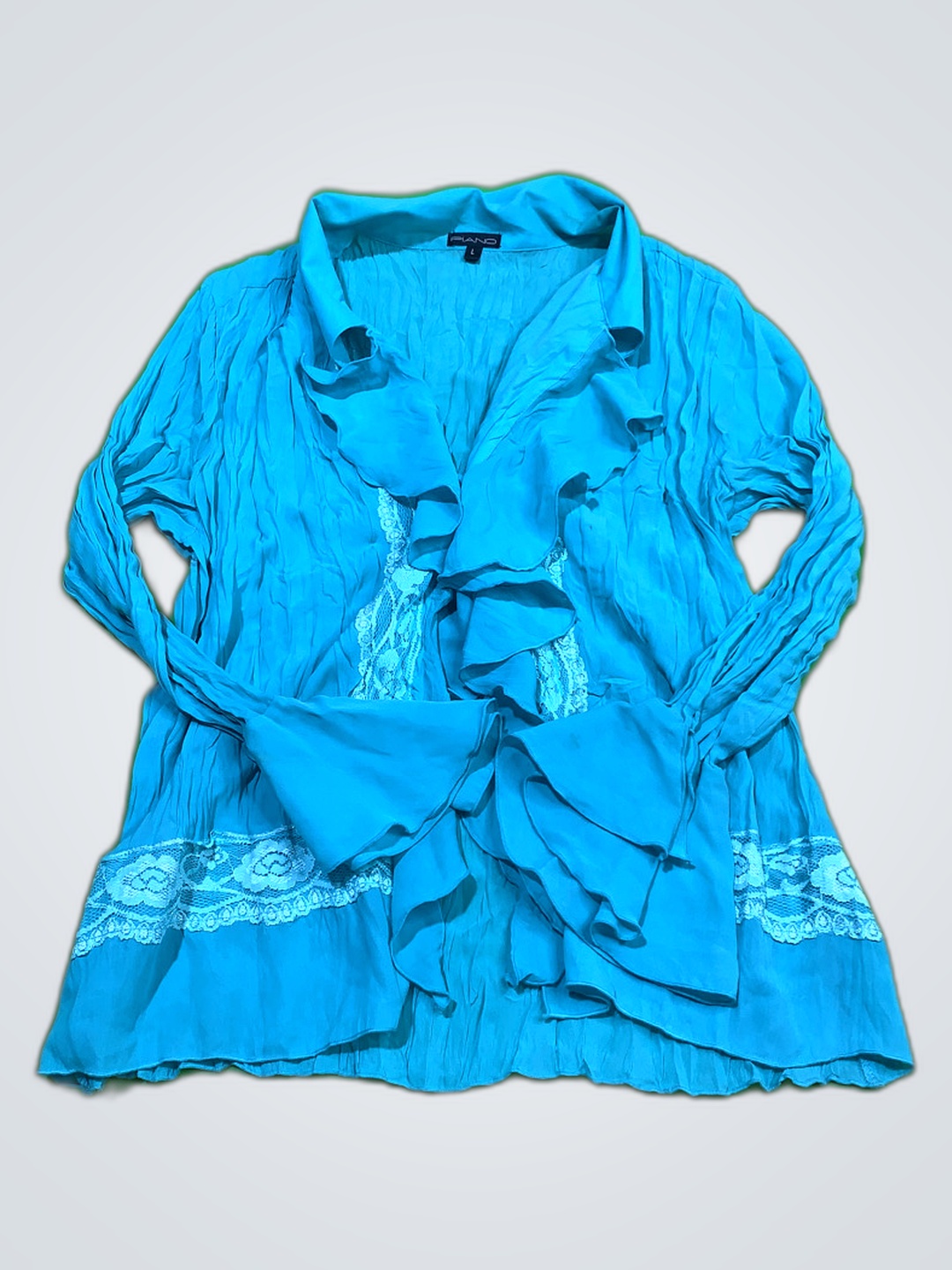 「ピアノターコイズラッフルブラウス」