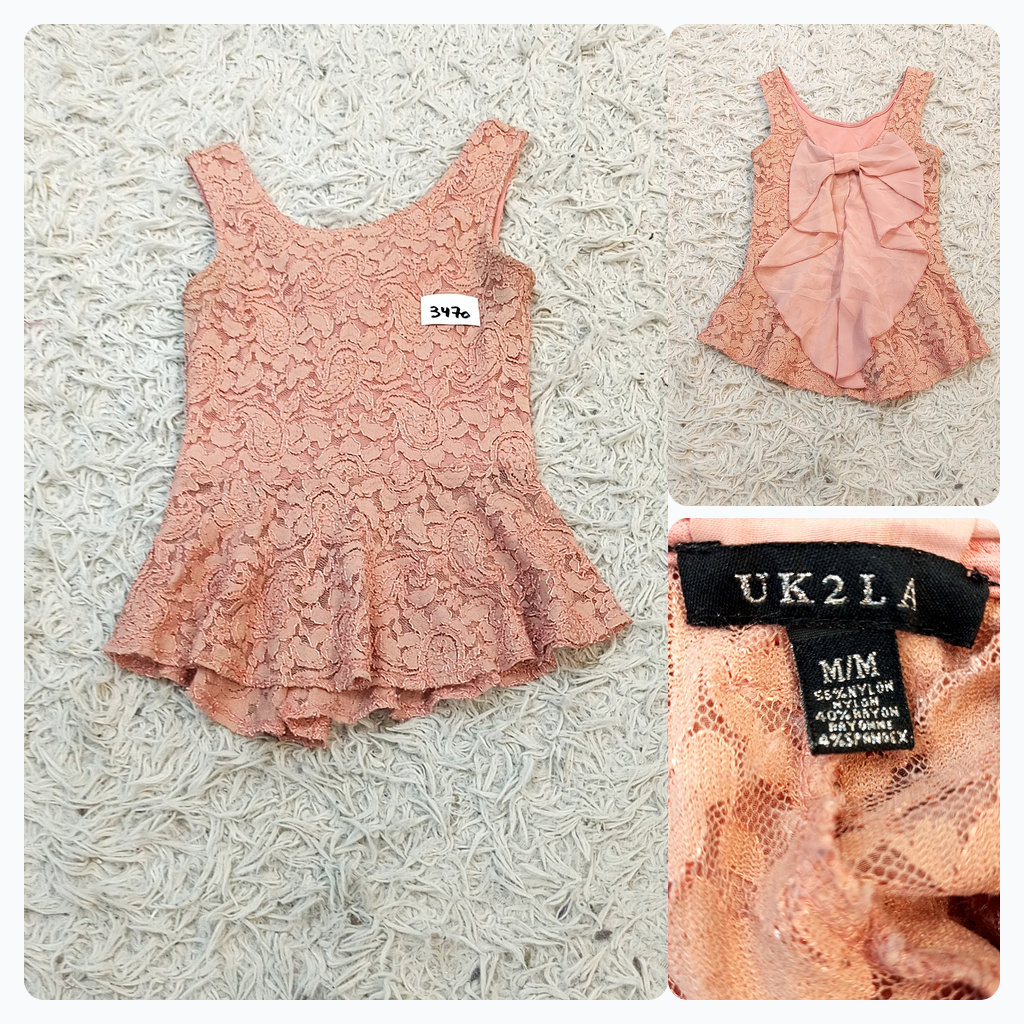Camiseta sin mangas de peplum de encaje con detall..