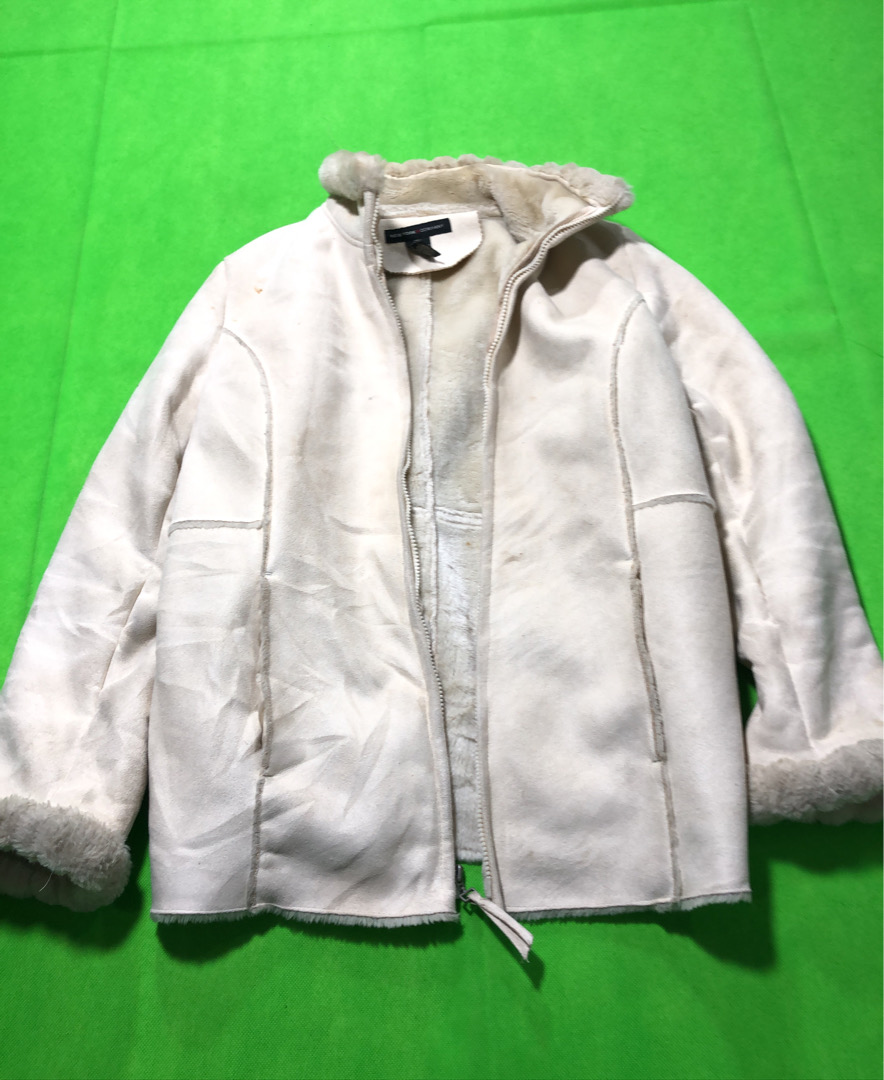 Veste en fausse fourrure blanche