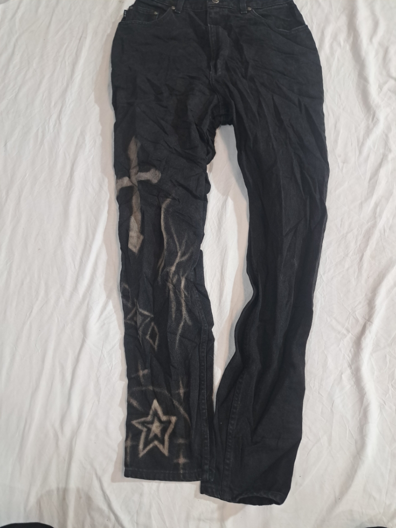 Black Jeans with Graphic Bleach Design