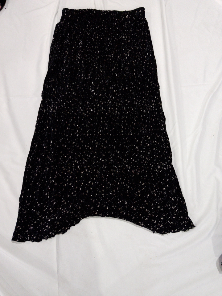 Jupe midi plissée noire avec motif étoile