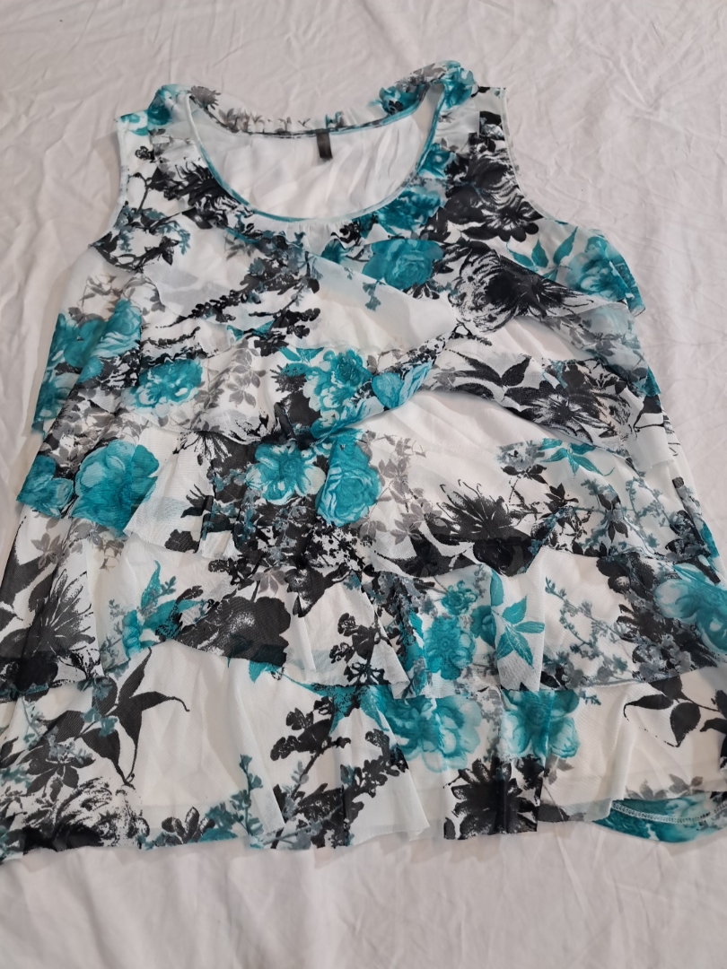 Blouse sans manches à imprimé floral