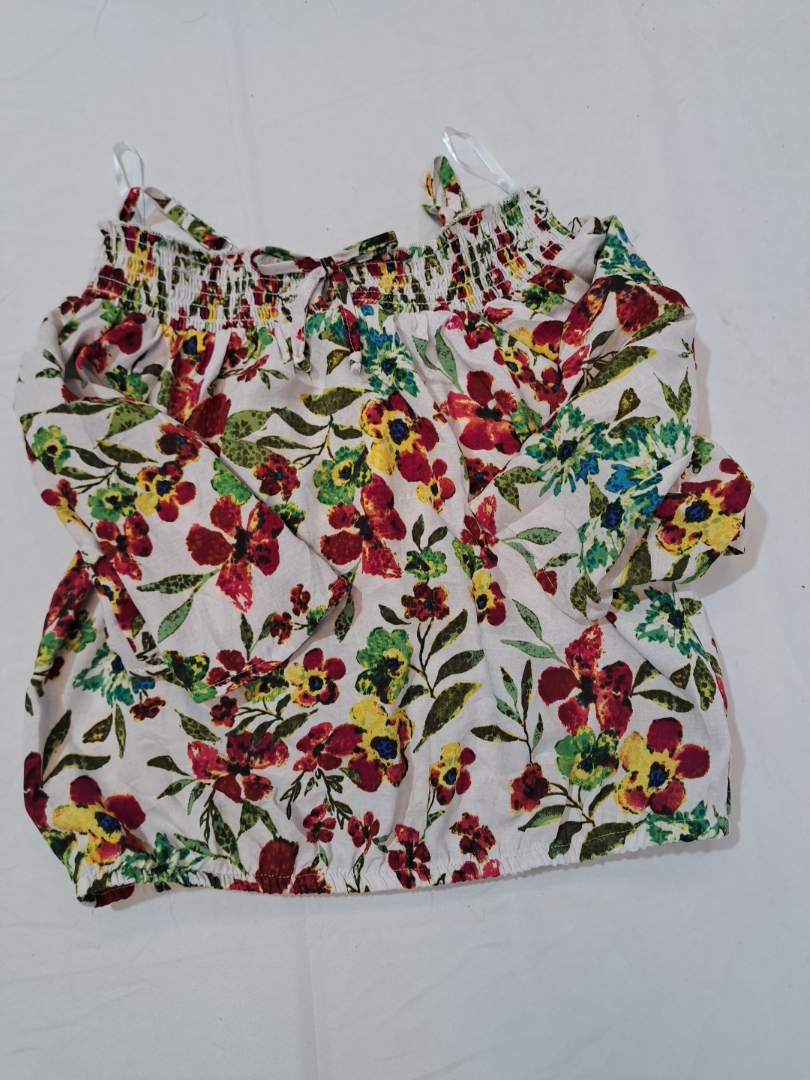 Top a balze floreale da donna