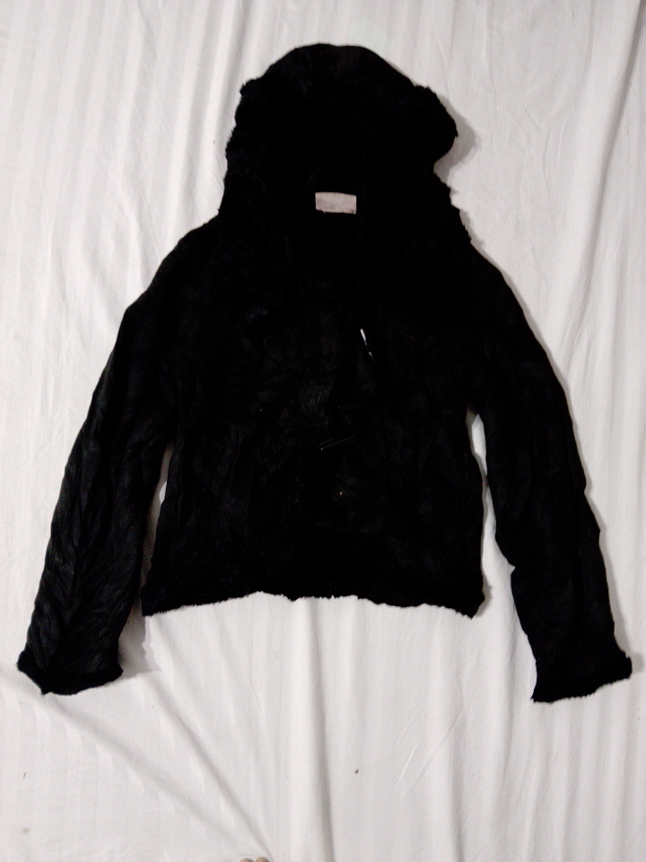 Giacca in pelliccia sintetica nera