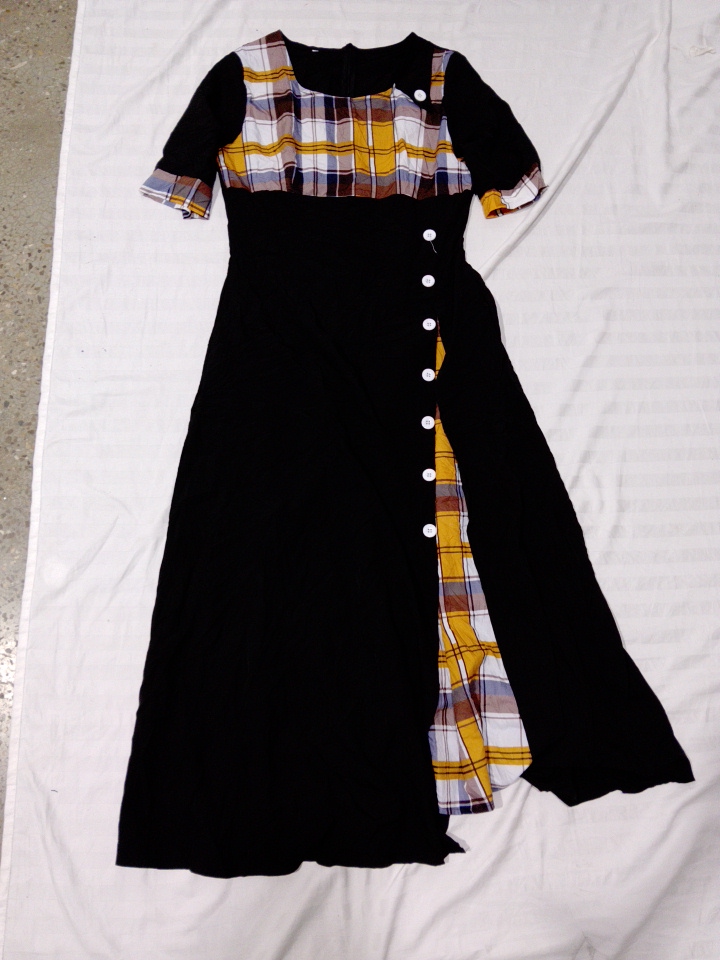 Abito a trapezio con dettagli a quadri