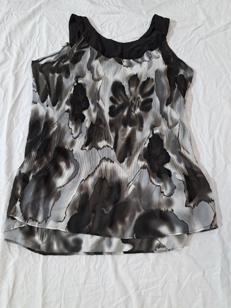 Blusa con motivo floreale