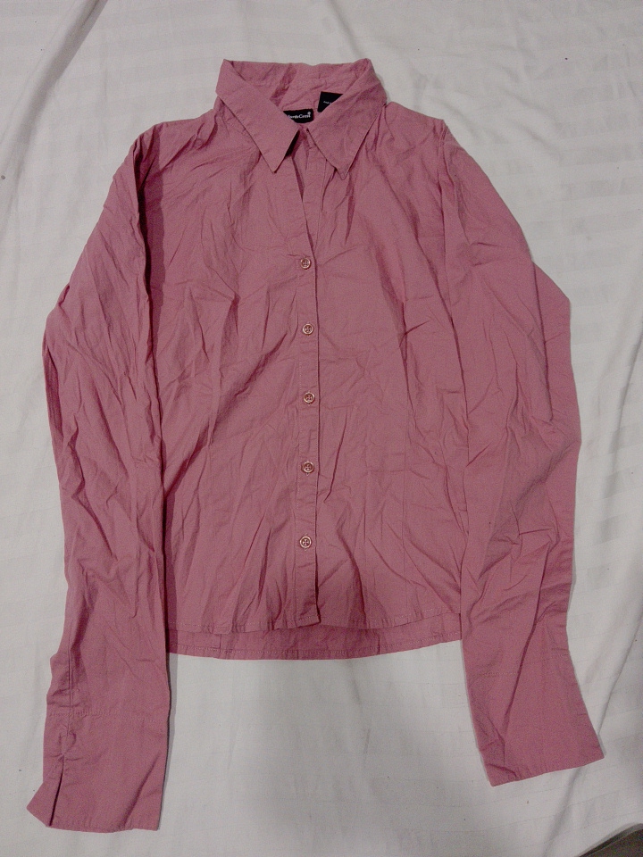 Chemise à boutons rose à manches longues