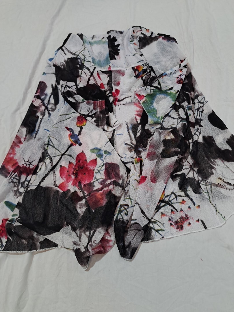 Gonna maxi trasparente multicolore con stampa flor..