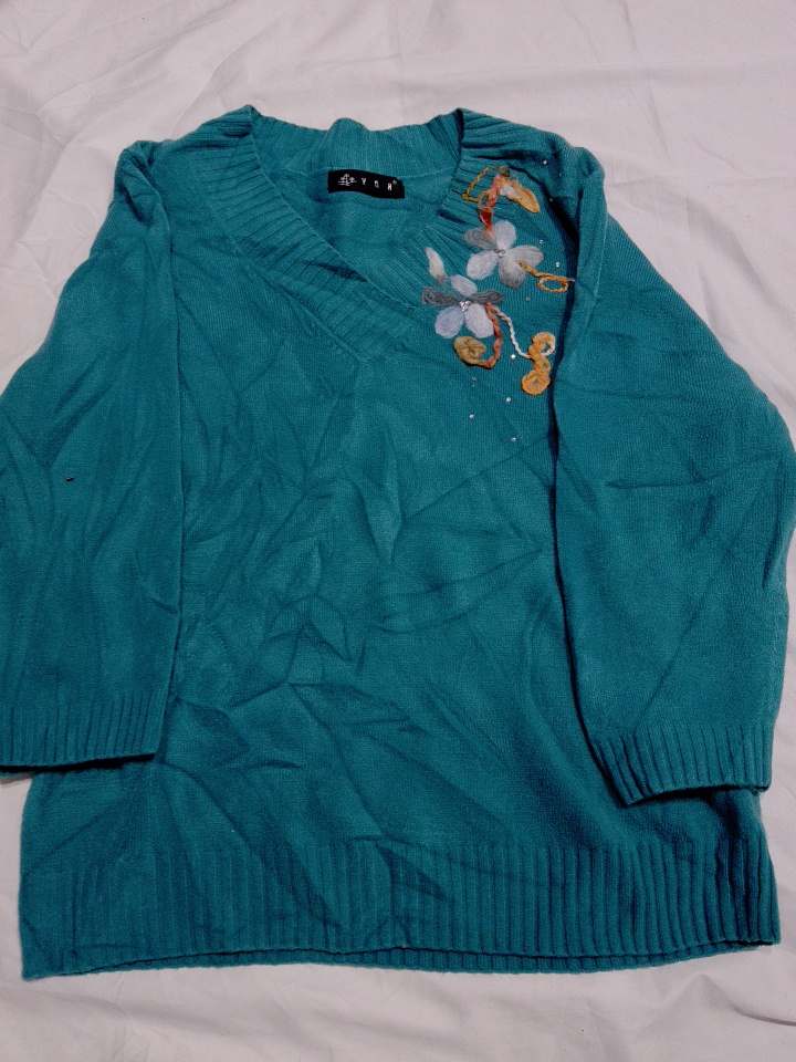 Gilet en tricot brodé teal Y&A