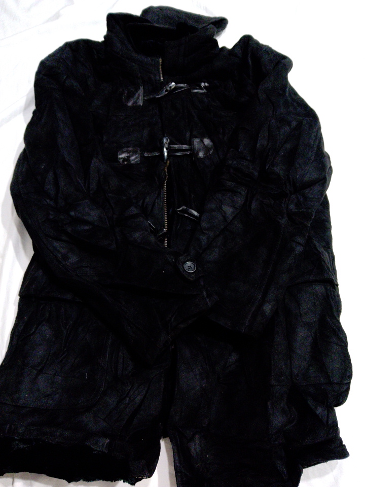 ブランドなしの黒いトグルコート