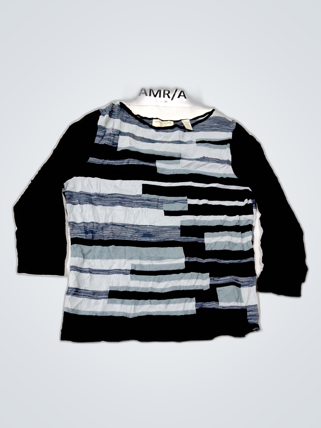 Valerie Stevens separates long sleeve shirt