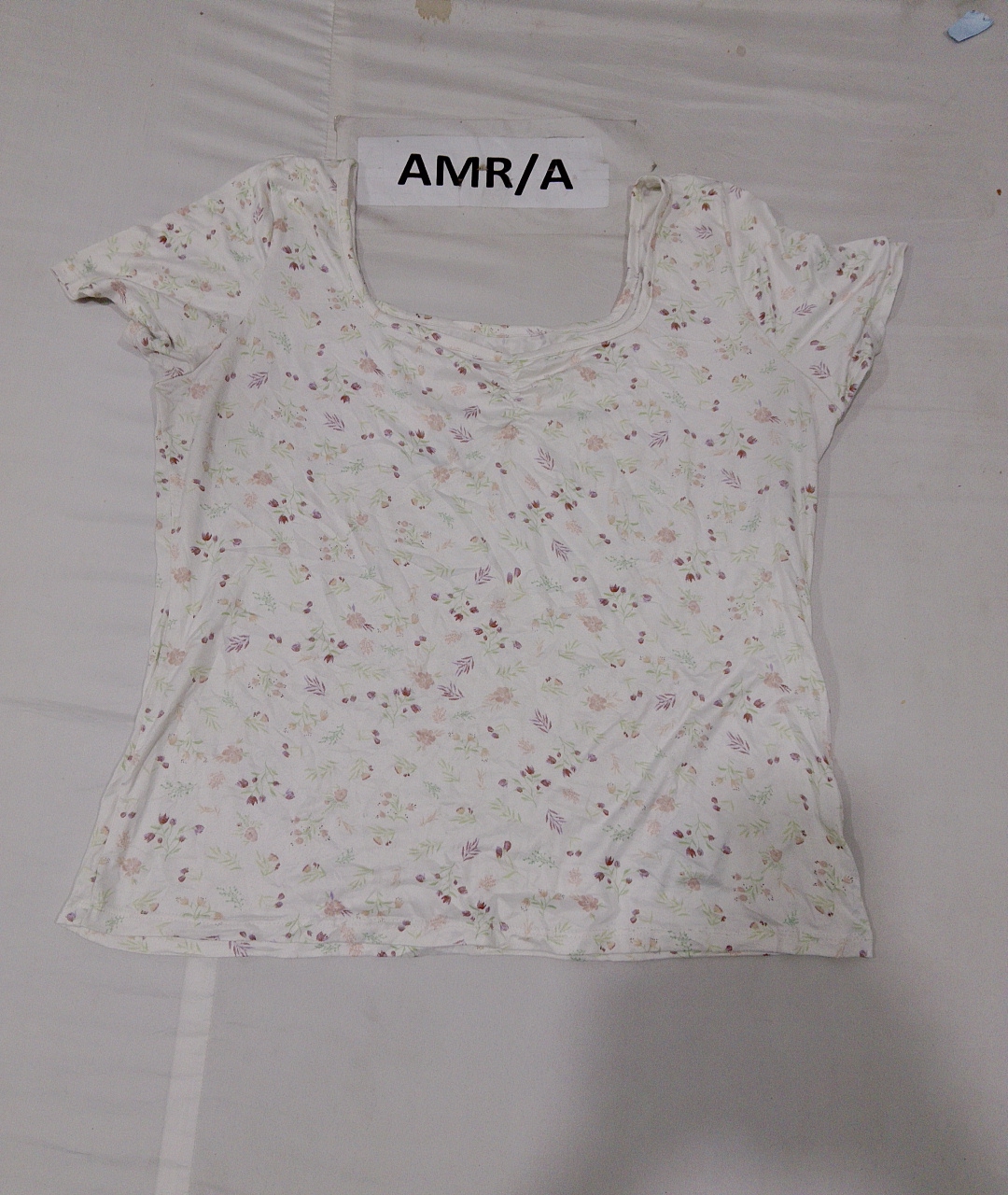 Blusa con motivo floreale