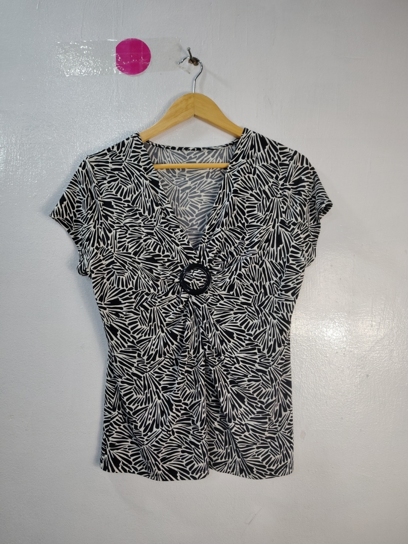 Blusa con motivo bianco e nero