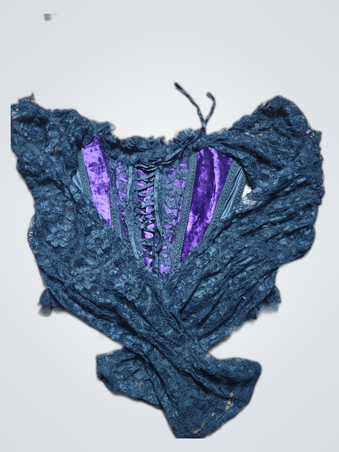 Top en corset en dentelle noire avec des accents e..