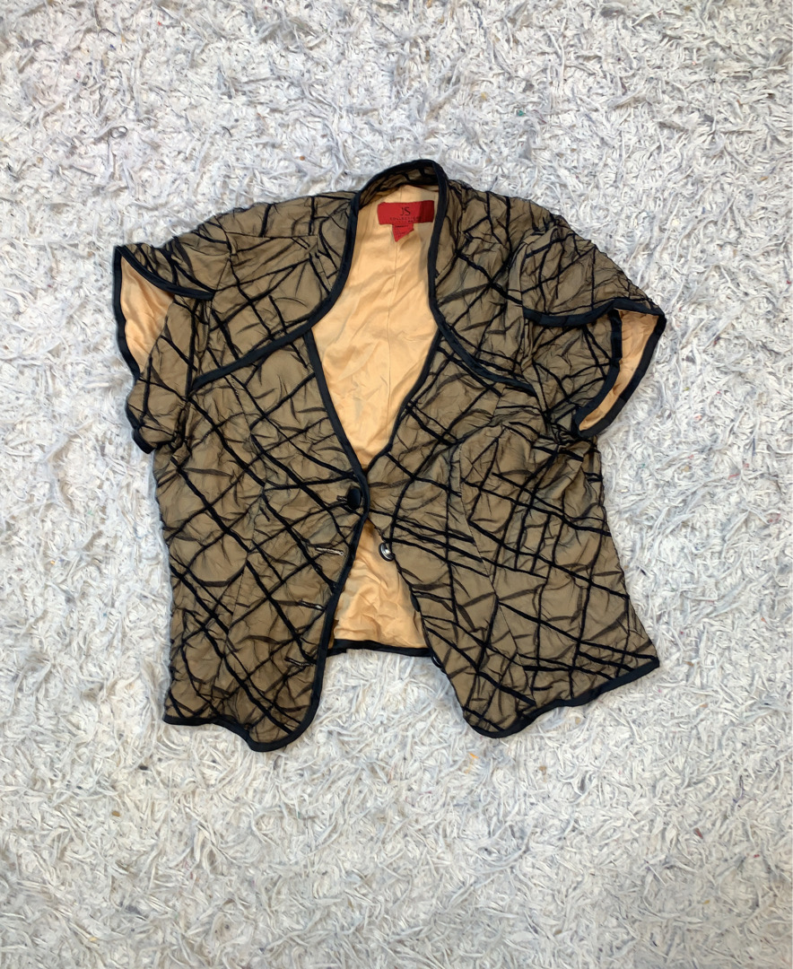 Veste noire et beige transparente